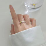 Anillo de plata en forma de margarita